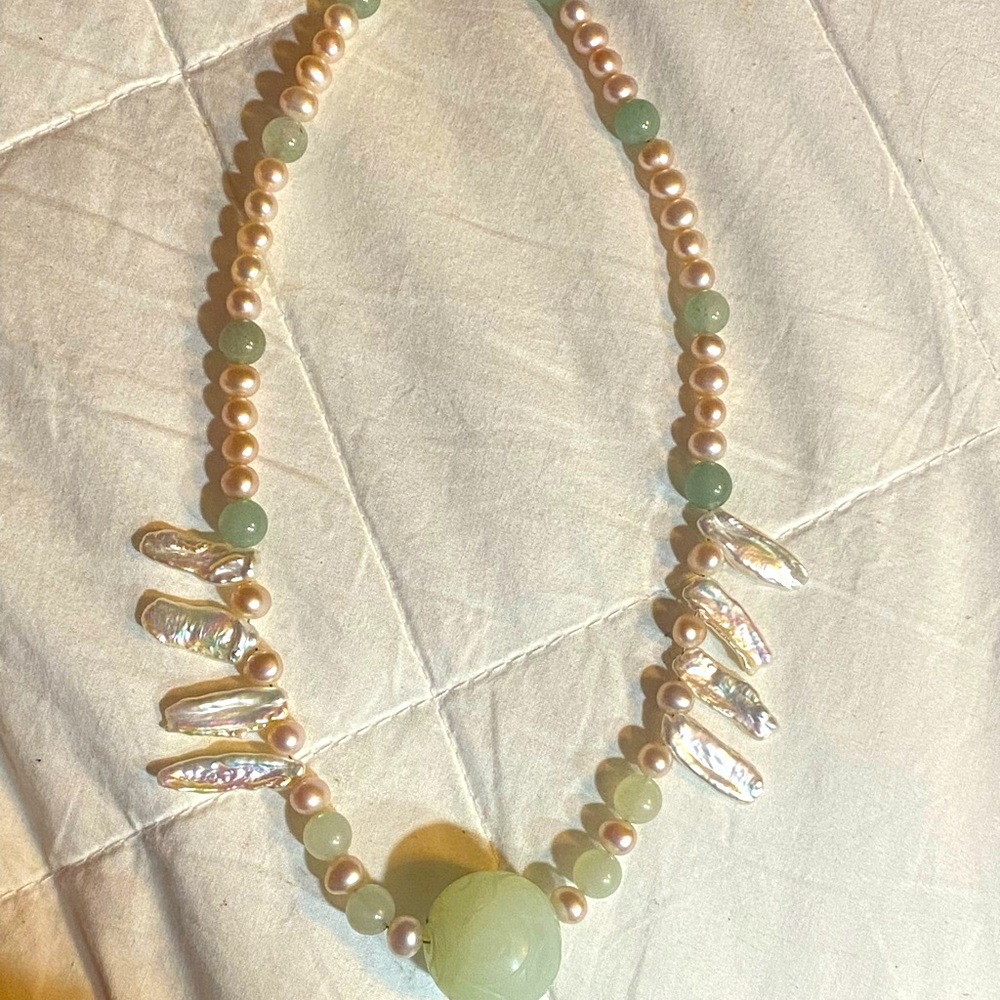 Beautiful and rare Mutton Fat jade with several types of pearls.